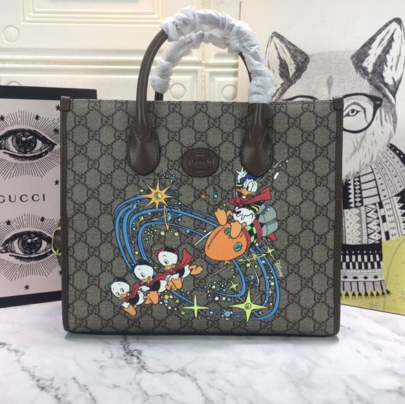 G*u*i shopping bags